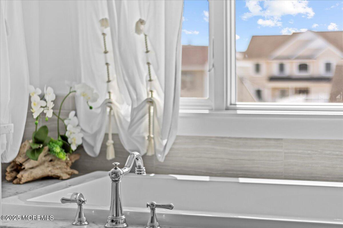 1730 Rue Mirador, Unit WINTER MONTHLY RENTAL Point Pleasant, NJ 08742 - Photo 23 of 72 a view of a potted plant next to a window