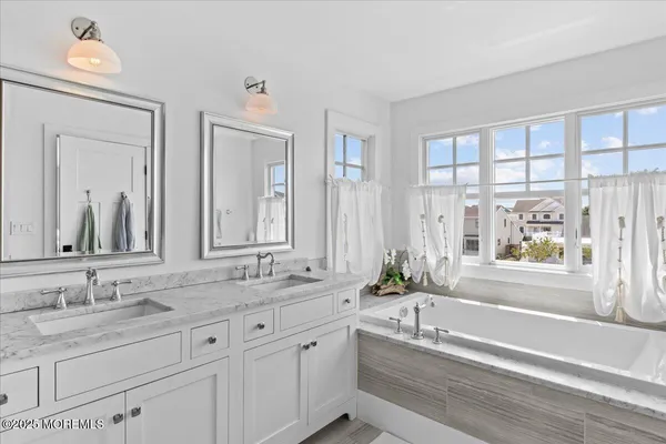 a bedroom with a bed and furniture