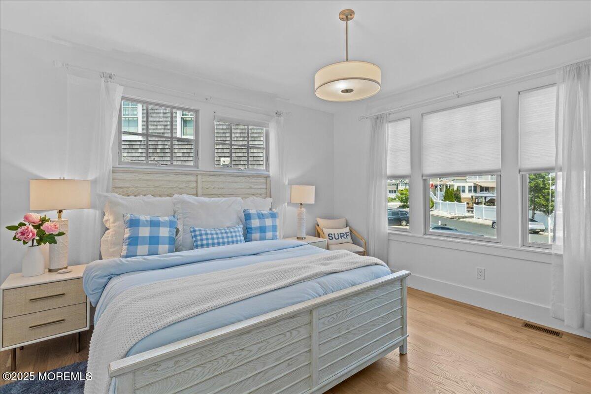 1730 Rue Mirador, Unit WINTER MONTHLY RENTAL Point Pleasant, NJ 08742 - Photo 37 of 72 a bedroom with a bed and a window