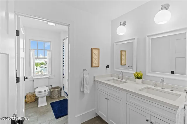 a front view of a house with a yard table and chairs