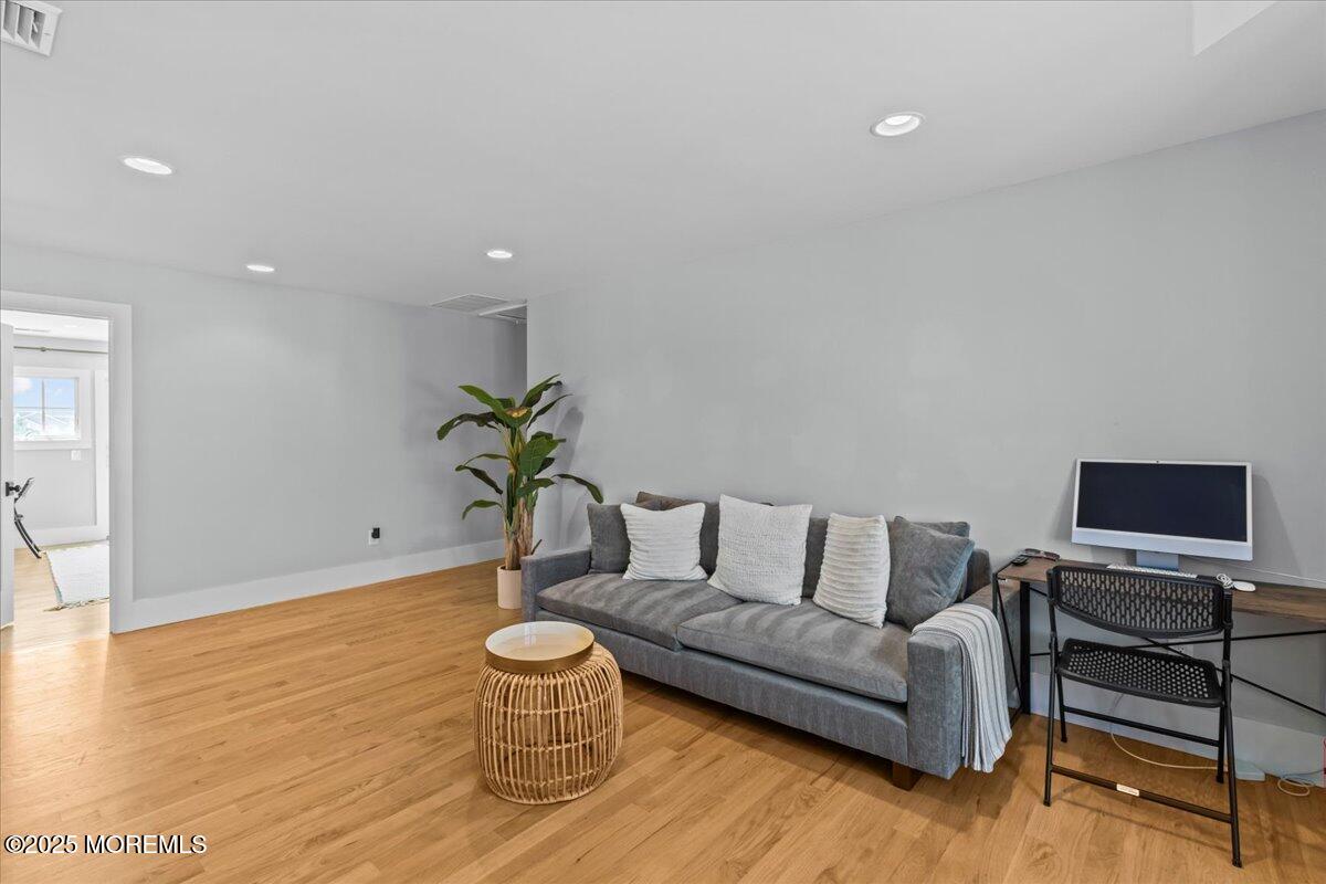 1730 Rue Mirador, Unit WINTER MONTHLY RENTAL Point Pleasant, NJ 08742 - Photo 41 of 72 a living room with furniture and a flat screen tv