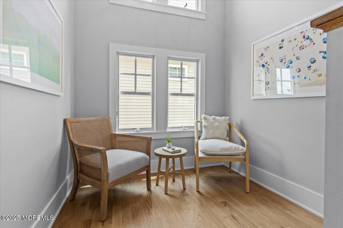 1730 Rue Mirador, Unit WINTER MONTHLY RENTAL Point Pleasant, NJ 08742 - Photo 43 of 72 a view of a room with furniture and wooden floor