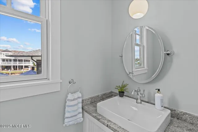 a view of a swimming pool with seating space