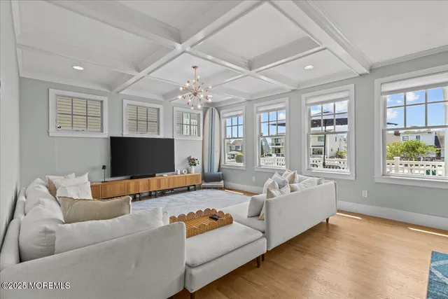 a kitchen with stainless steel appliances granite countertop stove top oven and cabinets