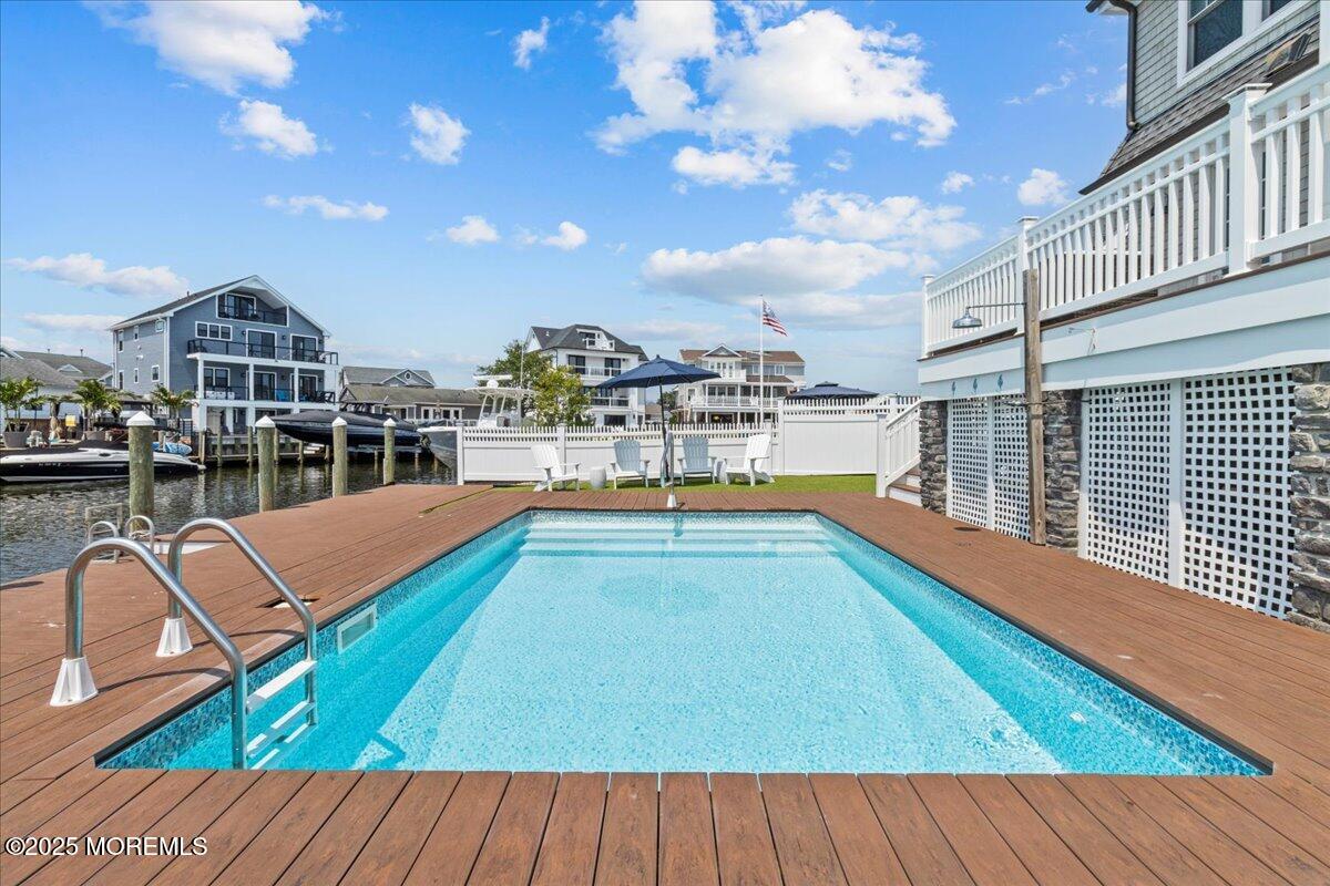 1730 Rue Mirador, Unit WINTER MONTHLY RENTAL Point Pleasant, NJ 08742 - Photo 64 of 72 a view of a swimming pool with seating space