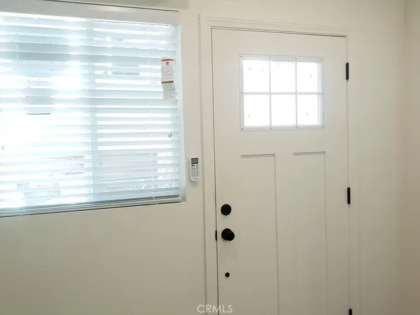 a view of a window in an empty room