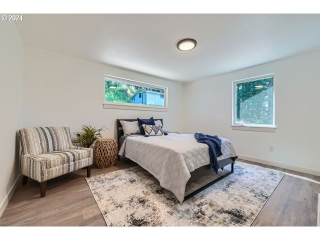 20064 South Central Point Road Oregon City, OR 97045 - Photo 19 of 34 a bedroom with a bed and a couch