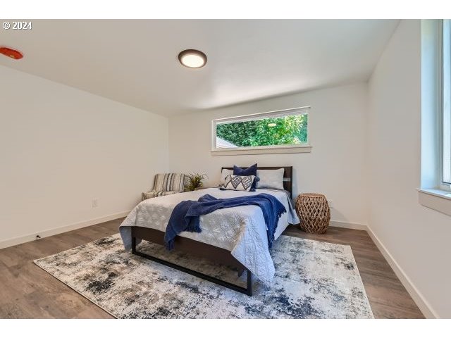 20064 South Central Point Road Oregon City, OR 97045 - Photo 20 of 34 a bedroom with a bed and a window
