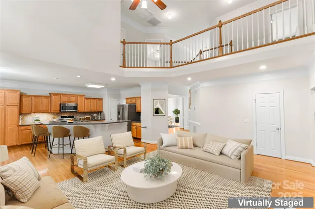 a spacious bathroom with a tub sink and mirror