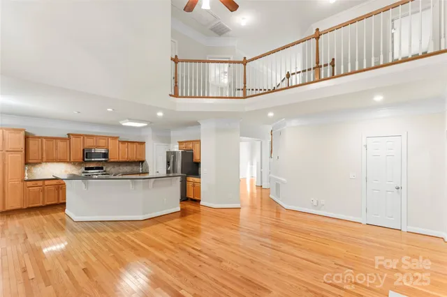 a spacious bathroom with a tub shower and sink