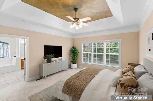 a living room with furniture a couch and a window