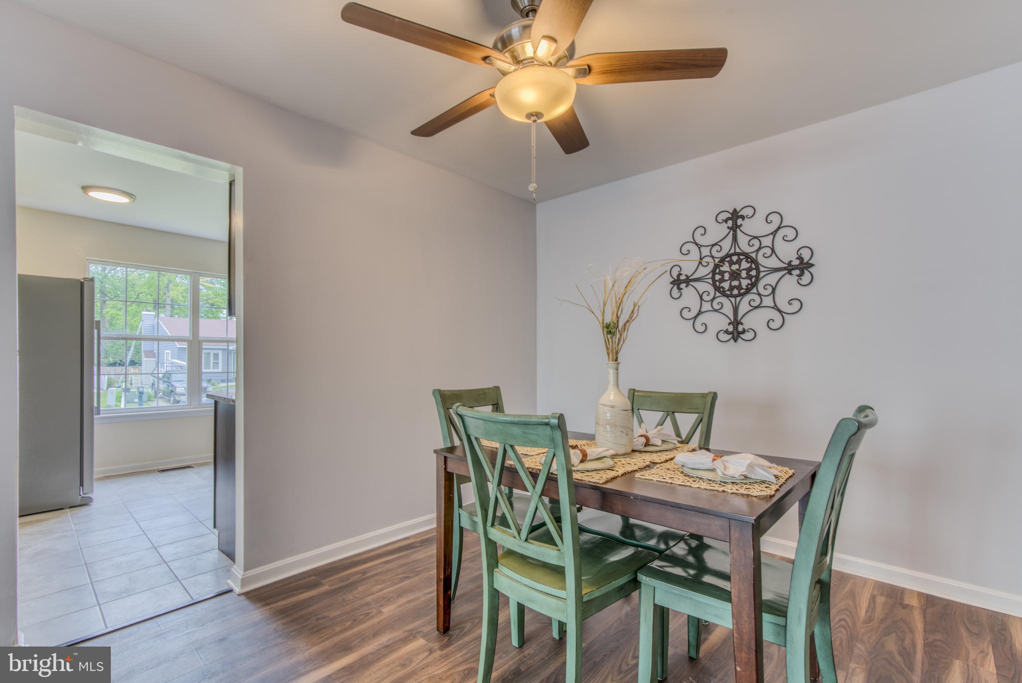 300 Redbud Road Edgewood, MD 21040 - Photo 13 of 65 a view of a dining room with furniture window and wooden floor