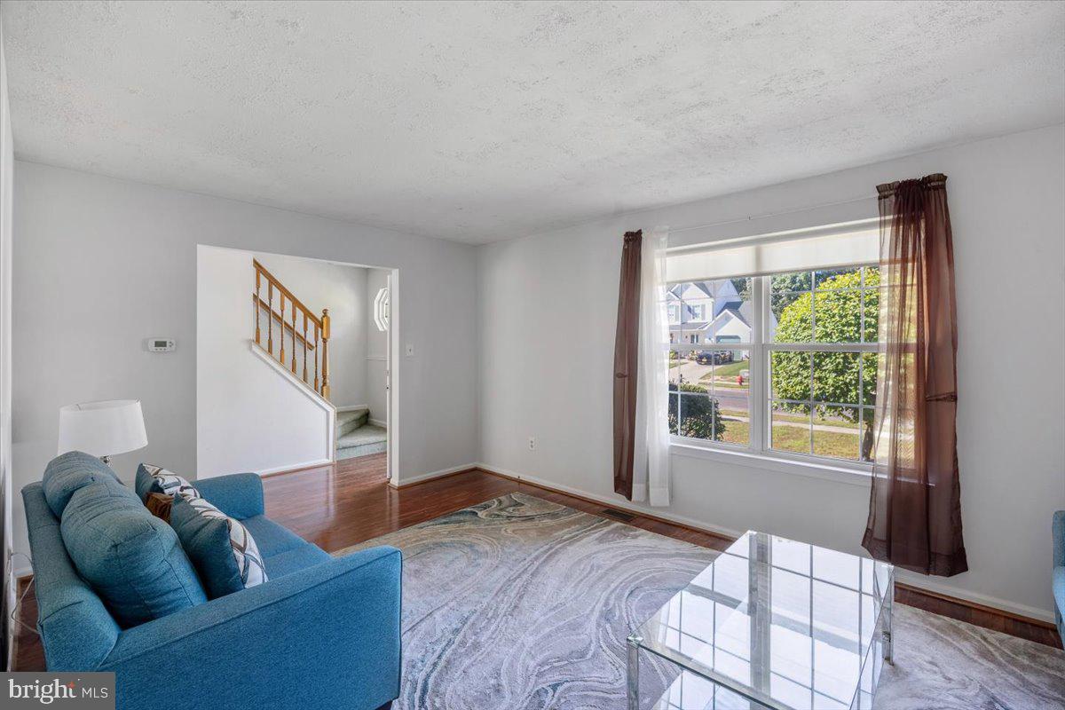 25 Country Club Road Pine Hill, NJ 08021 - Photo 17 of 40 a living room with furniture and a window