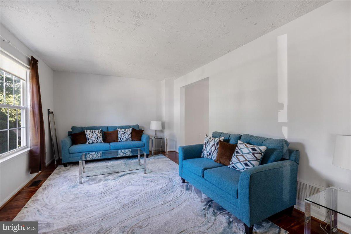 25 Country Club Road Pine Hill, NJ 08021 - Photo 18 of 40 a living room with furniture and a window