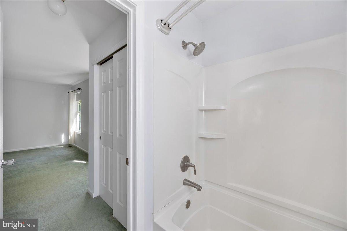 25 Country Club Road Pine Hill, NJ 08021 - Photo 20 of 40 a bathroom with a bathtub