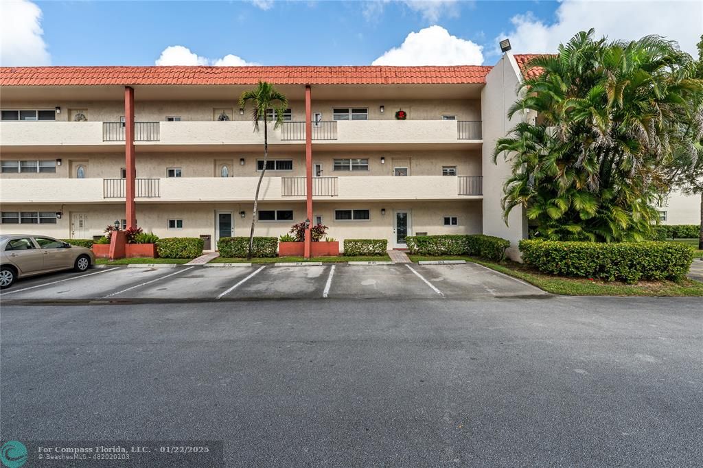 9523 South Hollybrook Lake Drive, Unit 102 Pembroke Pines, FL 33025 - Photo 25 of 63 a view of a street with cars parked