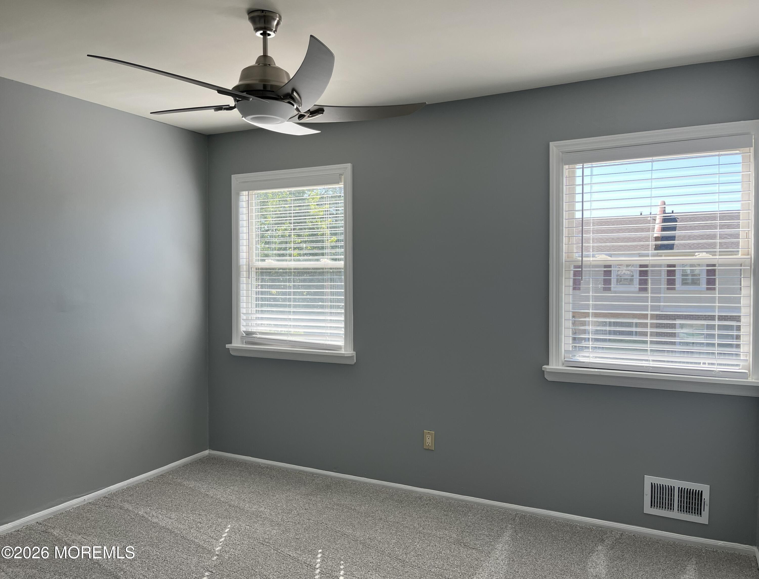 53 Primrose Lane Brick, NJ 08724 - Photo 11 of 17 a view of an empty room with a window