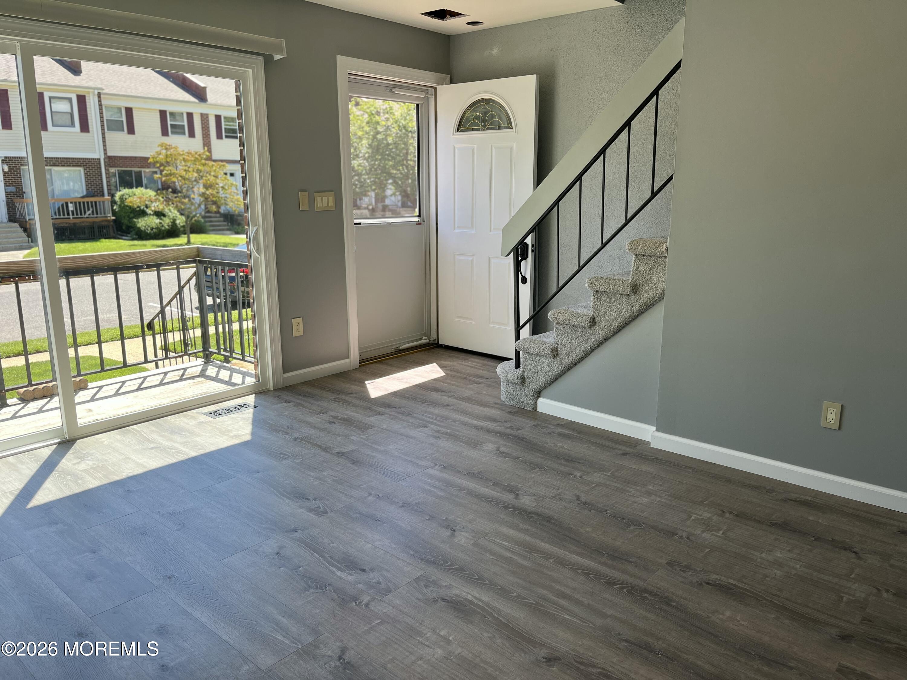 53 Primrose Lane Brick, NJ 08724 - Photo 4 of 17 a view of entryway with wooden floor