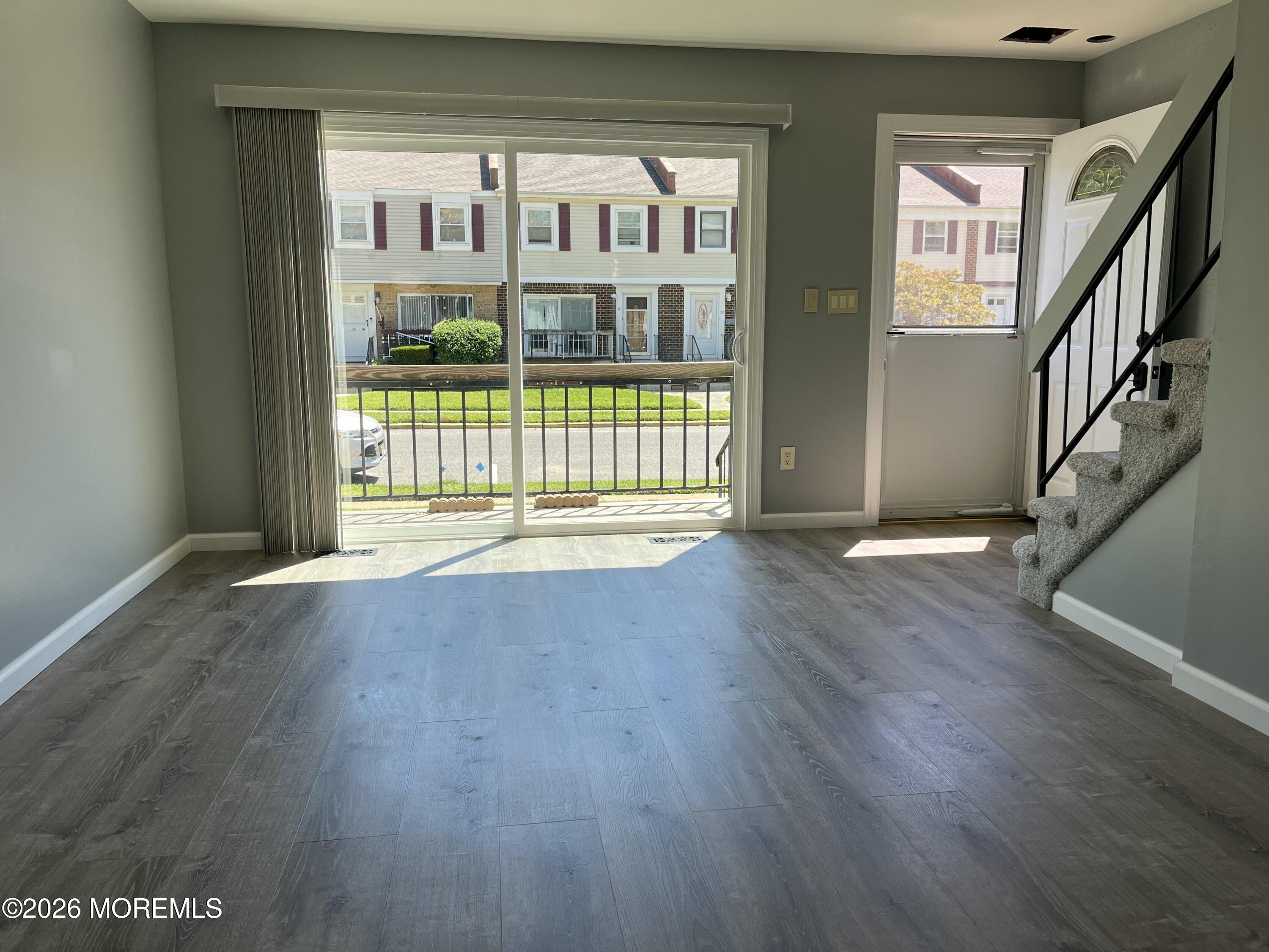 53 Primrose Lane Brick, NJ 08724 - Photo 5 of 17 a view of an entryway with wooden floor