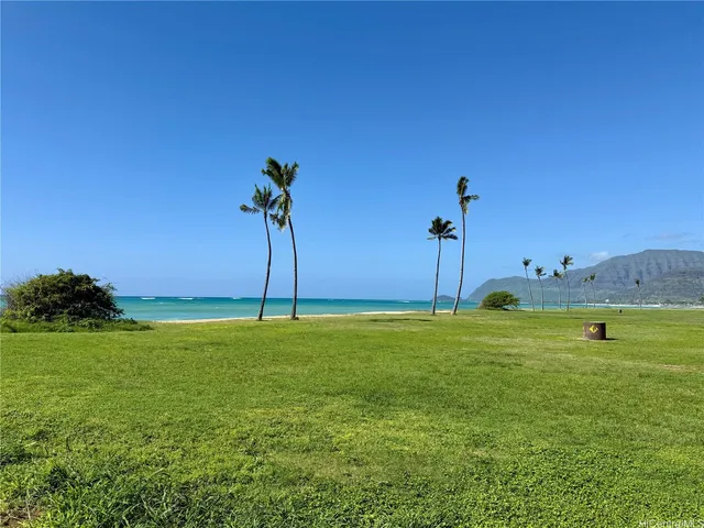 a view of a garden with a house