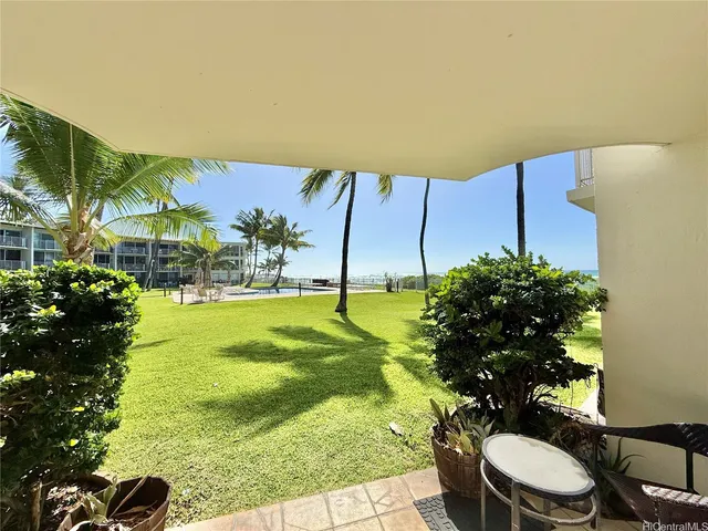 a bathroom with a sink mirror toilet and bathtub