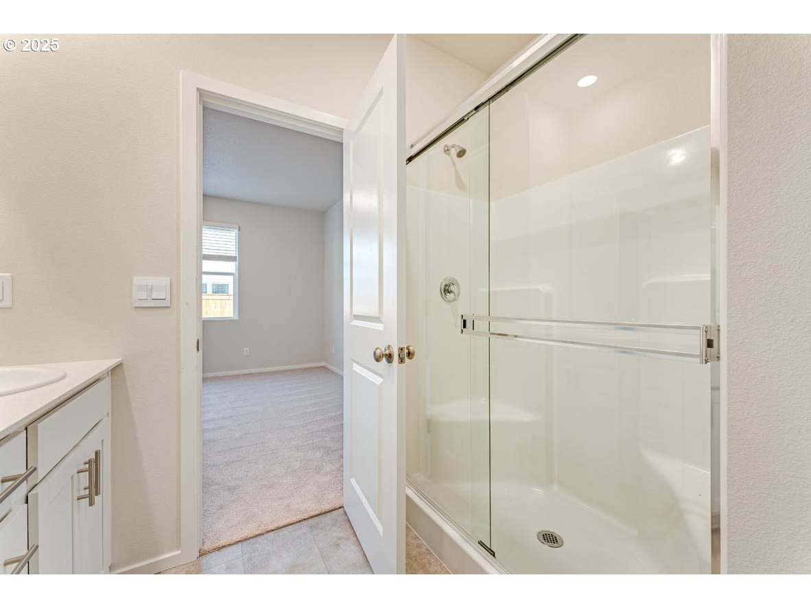 2963 U Street Springfield, OR 97477 - Photo 25 of 26 a bathroom with a shower