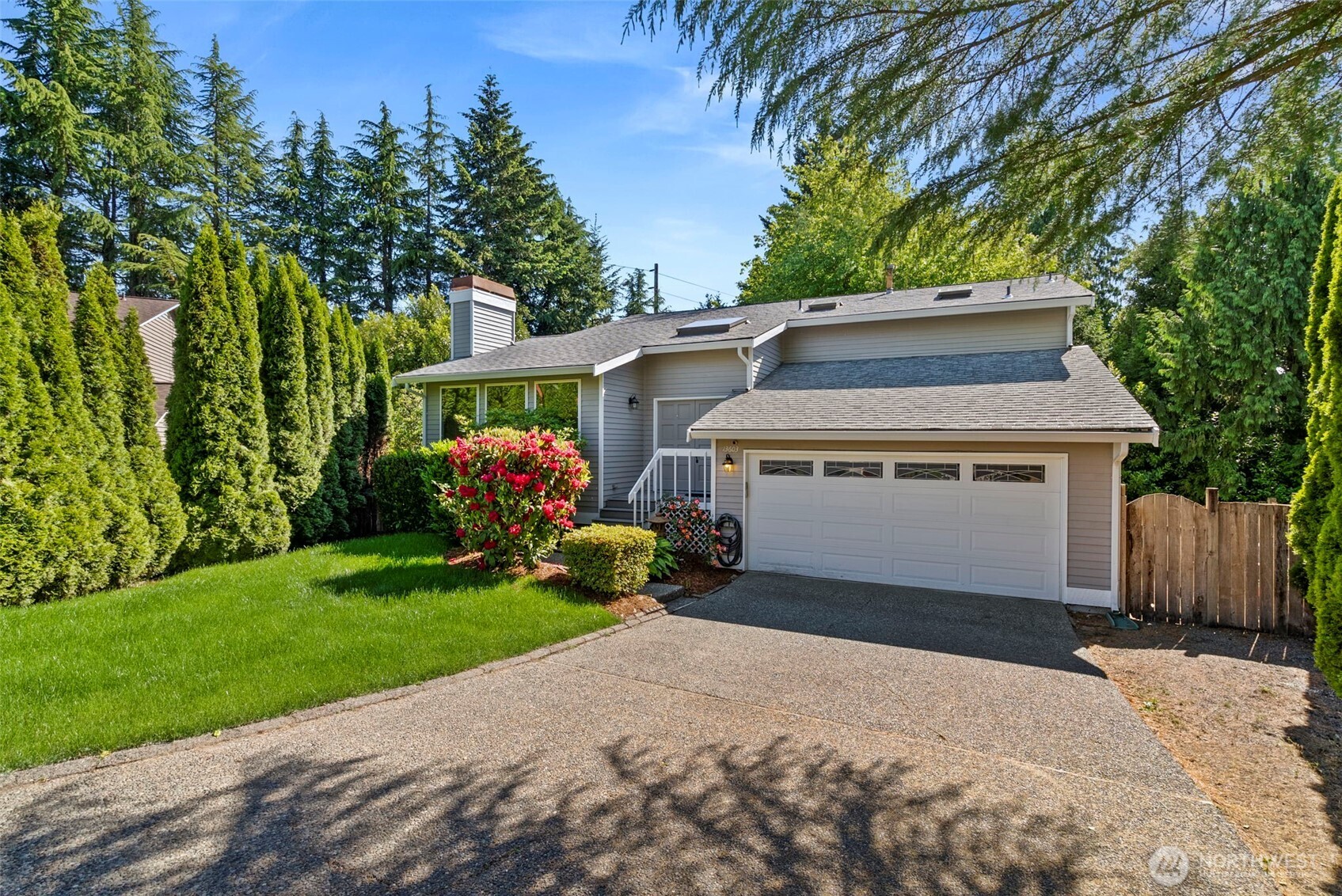 13603 Southeast 239th Street Kent, WA 98042 - Photo 1 of 23 a front view of a house with garden