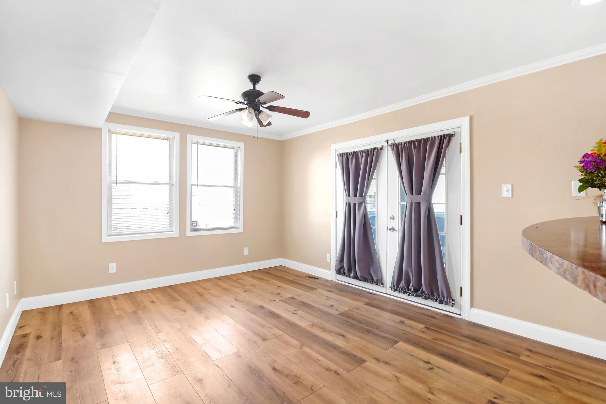 8104 Murray Point Road Dundalk, MD 21222 - Photo 13 of 44 Dining Area w/ French Doors & NEW Floor 2019