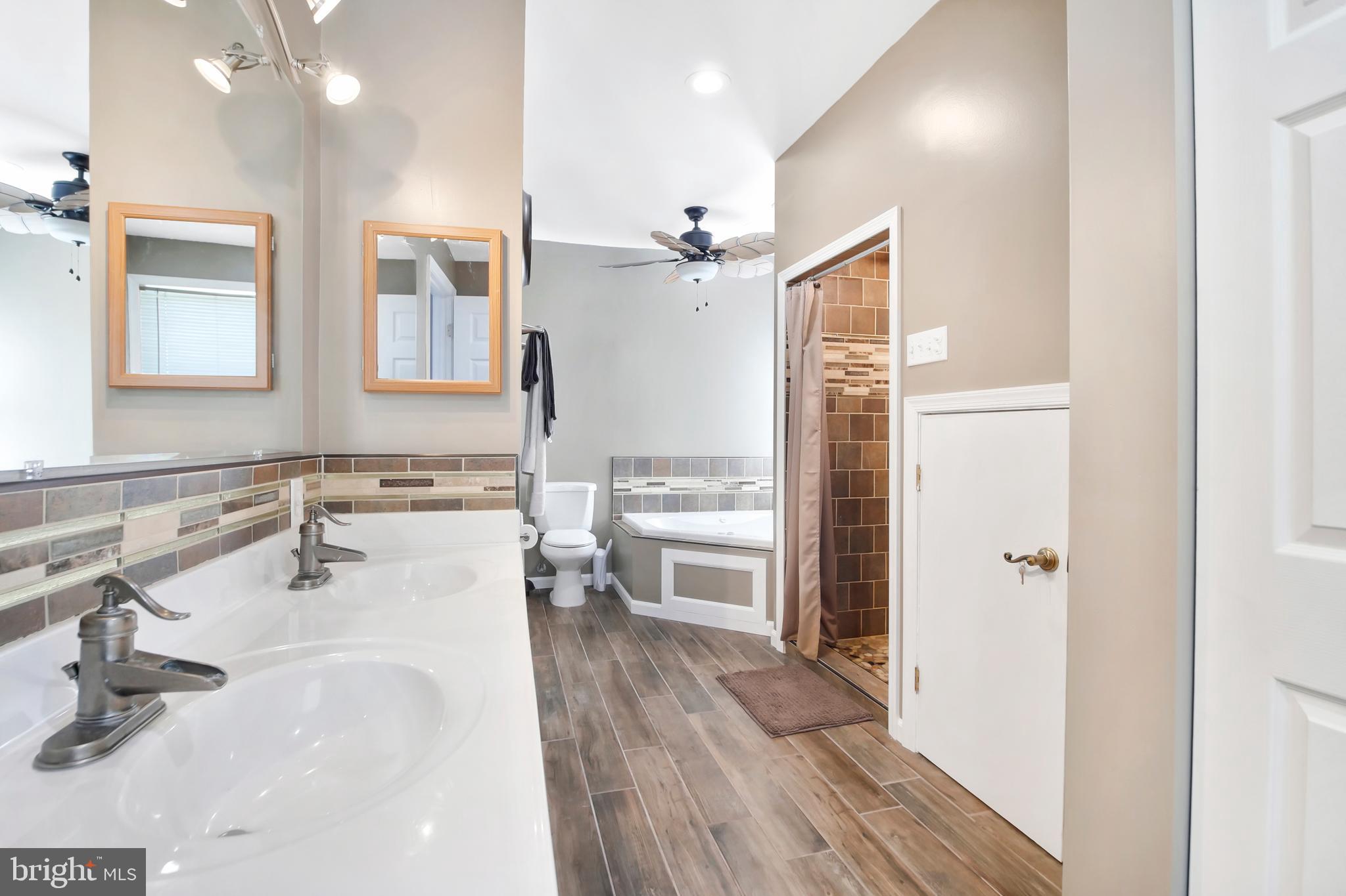 8104 Murray Point Road Dundalk, MD 21222 - Photo 20 of 44 En Suite Bath w/ Ceramic Tie floor
