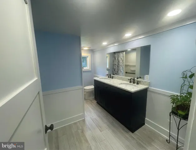 a kitchen with a sink stove and refrigerator