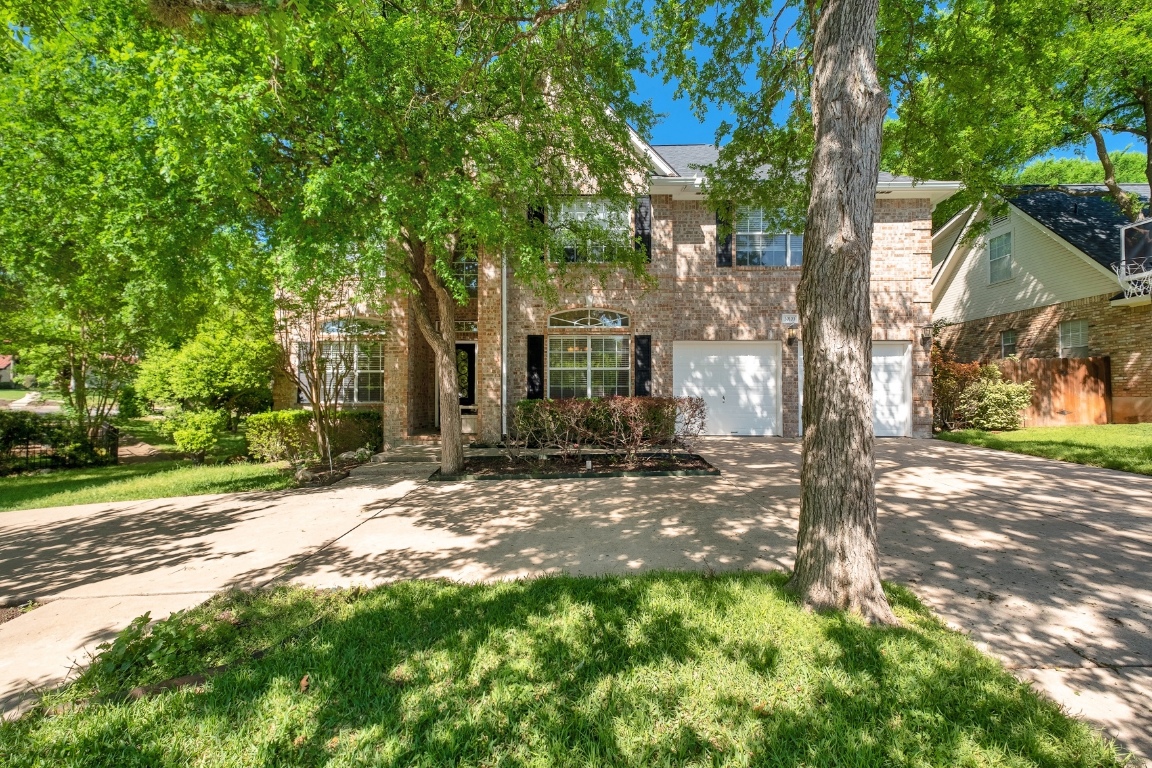 30103 Wingfoot Cove Georgetown, TX 78628 - Photo 1 of 38 a view of a house with a tree in the yard