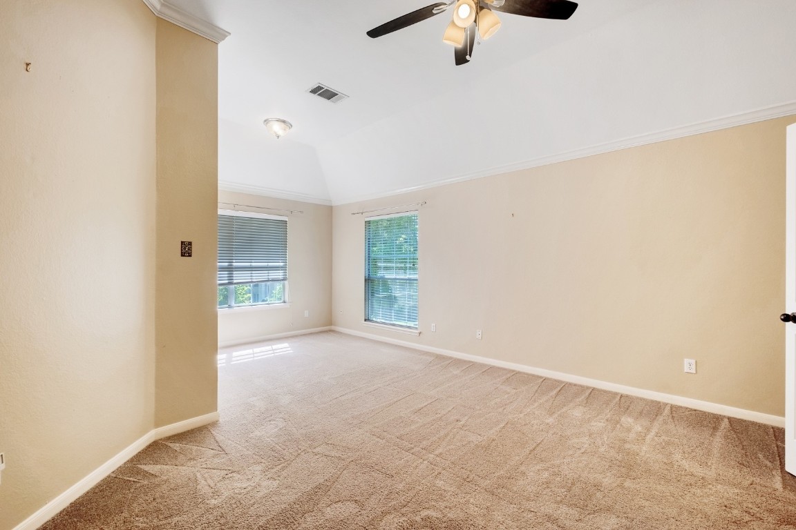 30103 Wingfoot Cove Georgetown, TX 78628 - Photo 30 of 38 an empty room with a empty space and windows