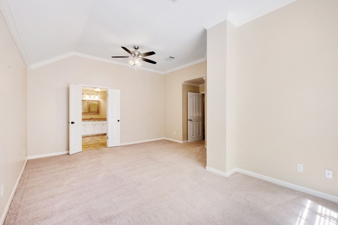 30103 Wingfoot Cove Georgetown, TX 78628 - Photo 31 of 38 an empty room with fan and entrance