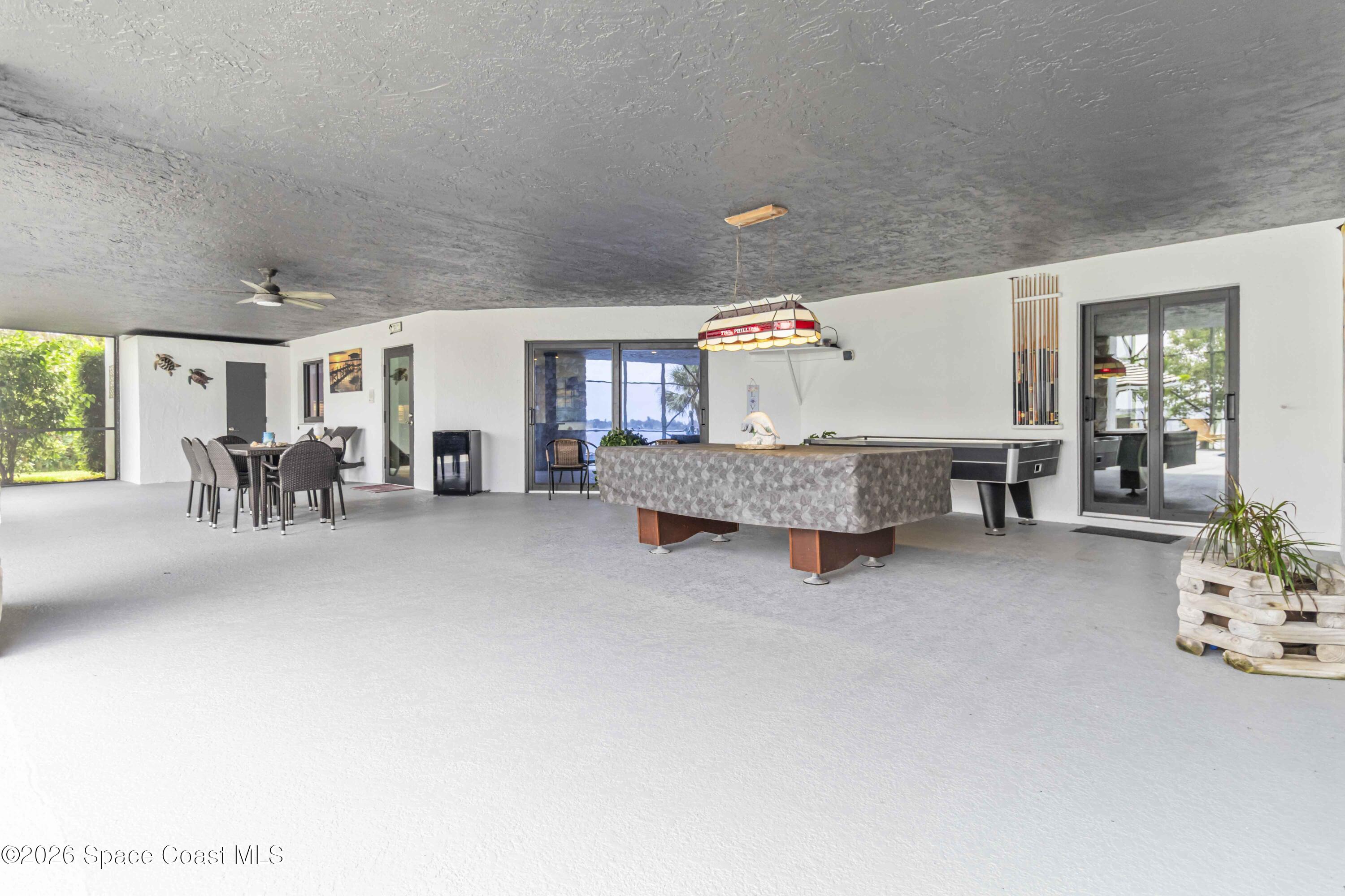 110 Barnacle Place Rockledge, FL 32955 - Photo 49 of 71 a living room with furniture and a table