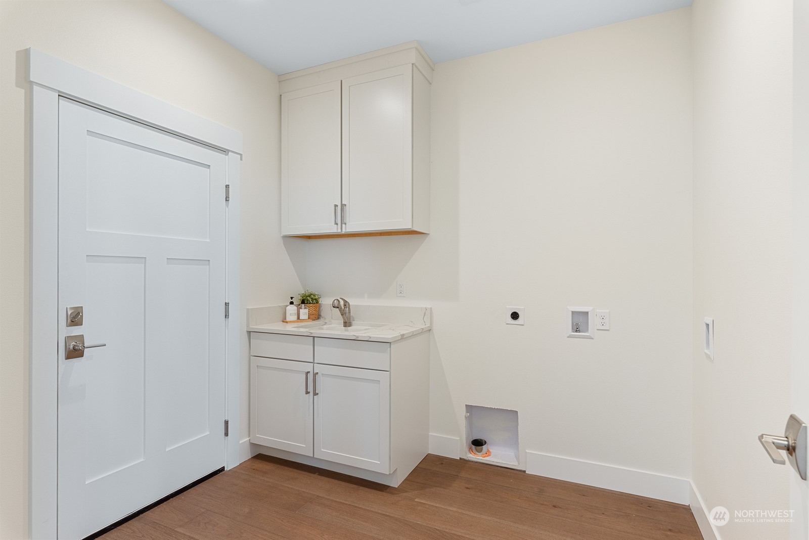 3908 West 3rd Street Anacortes, WA 98221 - Photo 24 of 39 a view of cabinets and wooden floor