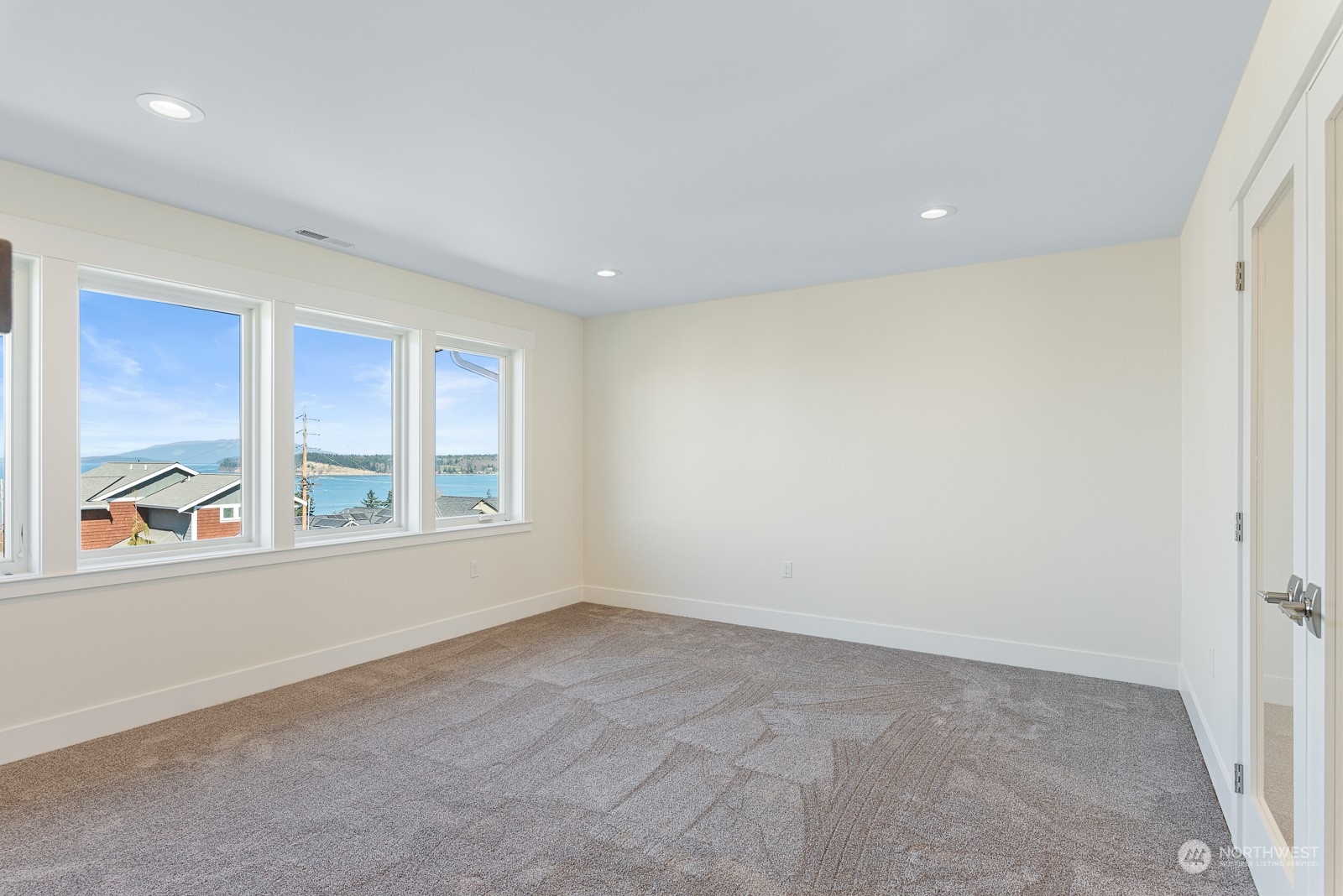 3908 West 3rd Street Anacortes, WA 98221 - Photo 28 of 39 an empty room with windows