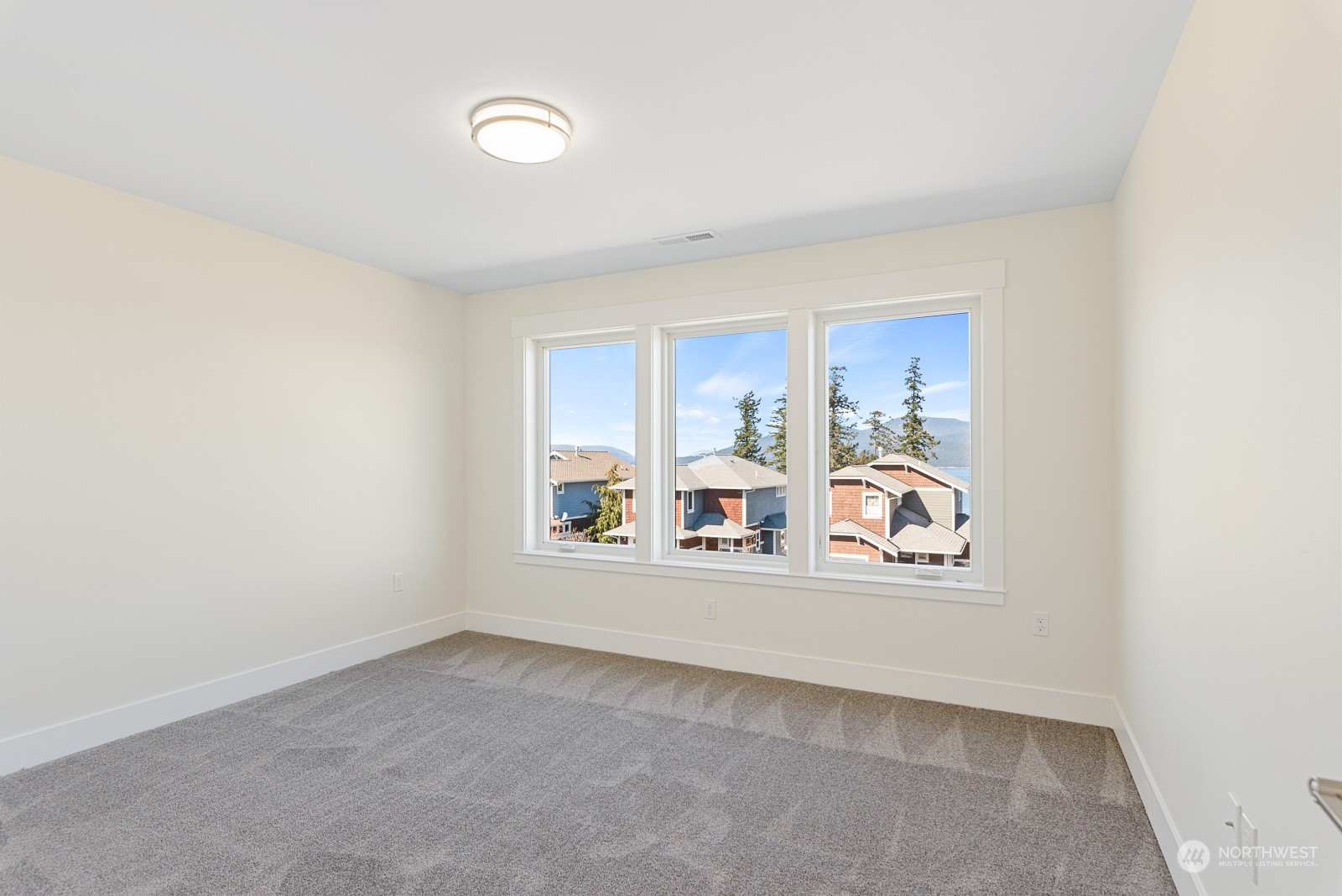 3908 West 3rd Street Anacortes, WA 98221 - Photo 29 of 39 an empty room with a window