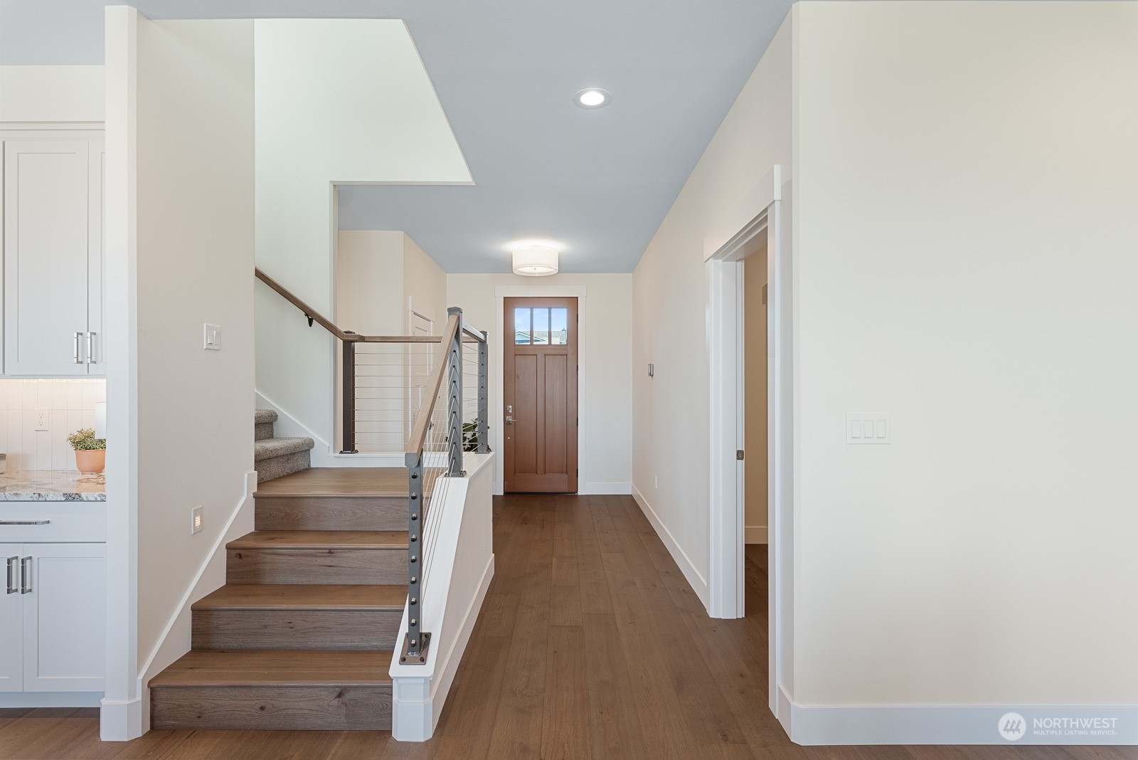 3908 West 3rd Street Anacortes, WA 98221 - Photo 6 of 39 a view of entryway with wooden floor