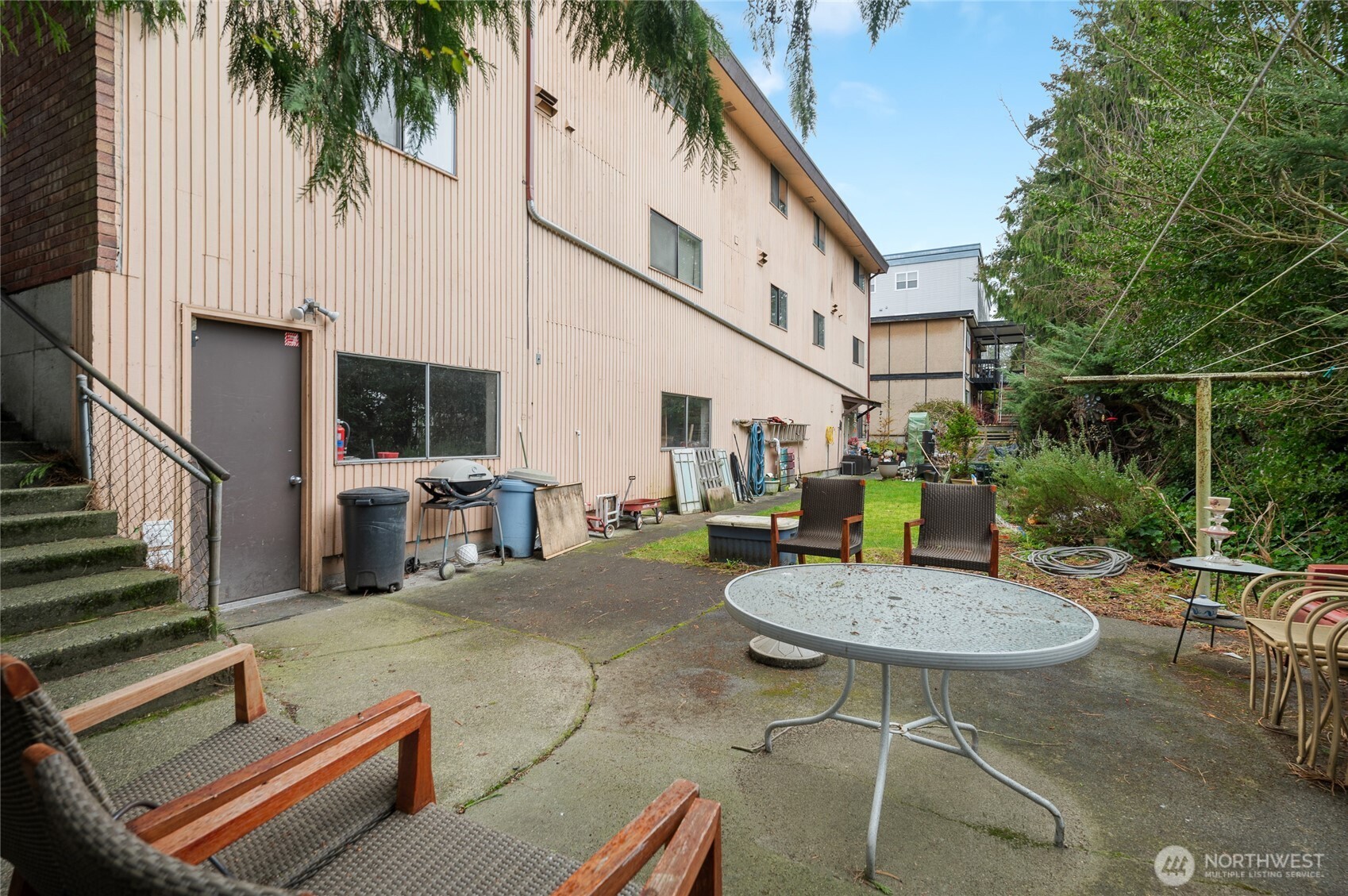 2014 Southwest 152nd Street Burien, WA 98166 - Photo 24 of 28 a backyard of a house with outdoor seating