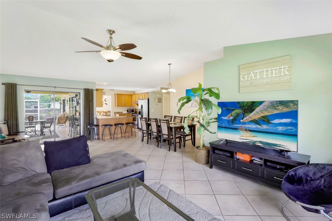 18507 Evergreen Road Fort Myers, FL 33967 - Photo 9 of 33 a living room with furniture and wooden floor