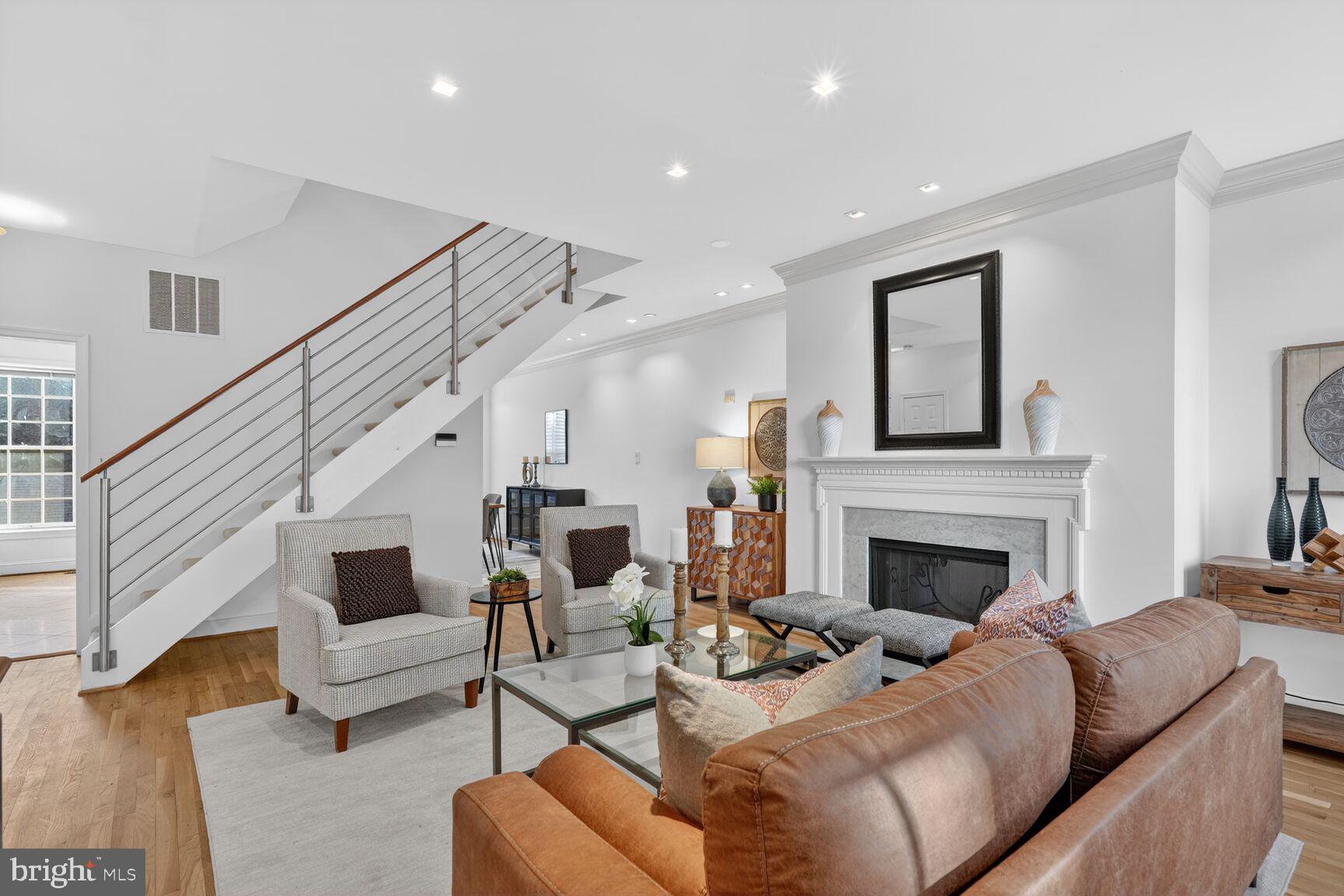 3540 Reservoir Road Northwest Washington, DC 20007 - Photo 3 of 25 Living room facing dramatic staircase