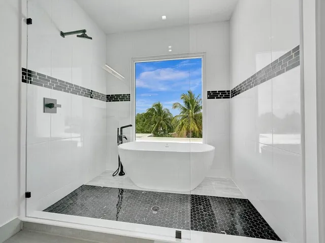 a bathroom with a sink and a window
