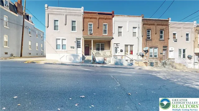 a view of a building with a street