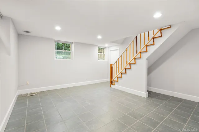 a view of an entryway with stairs