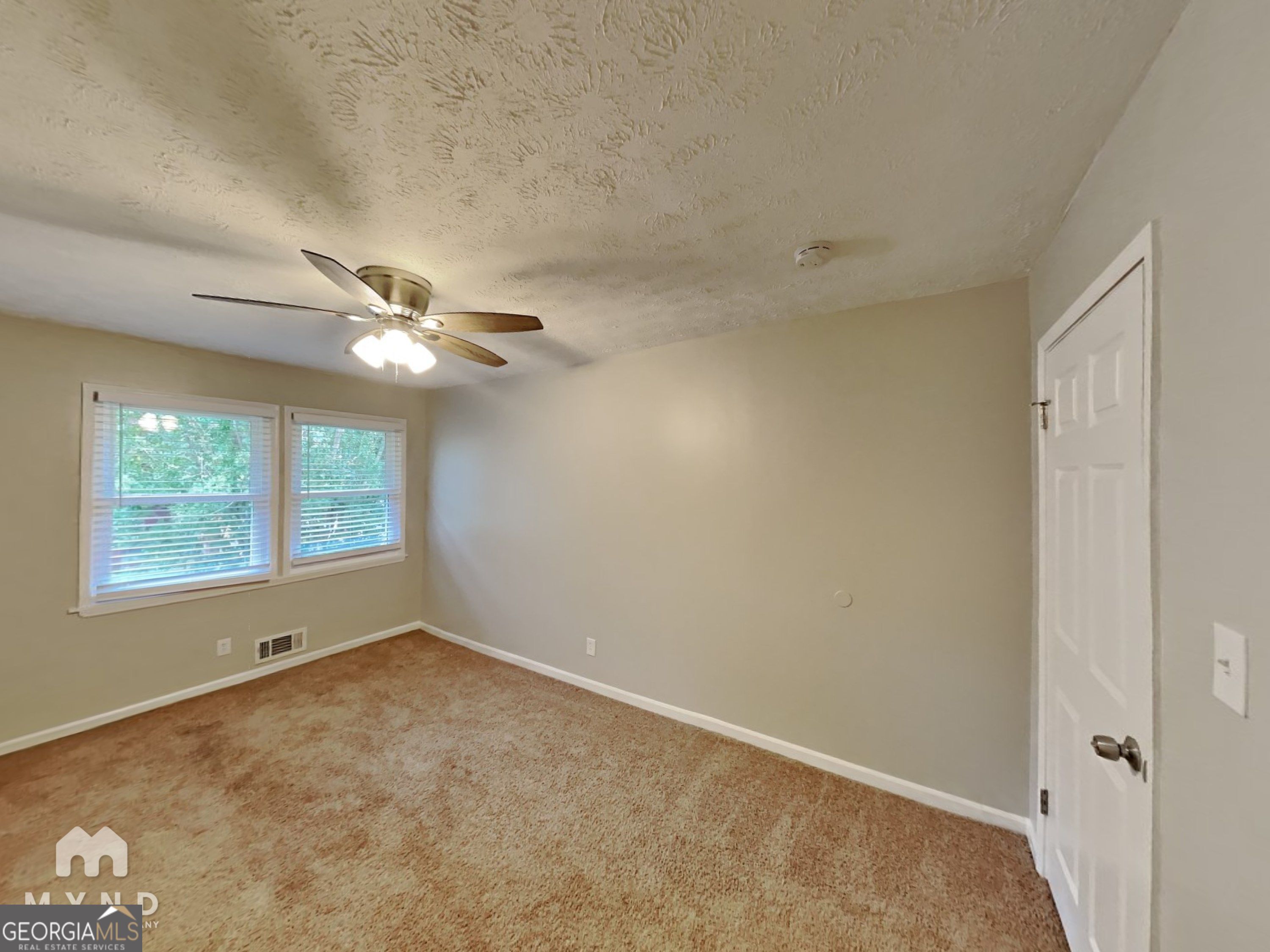 3821 Rex Circle Rex, GA 30273 - Photo 9 of 16 a view of an empty room with a window