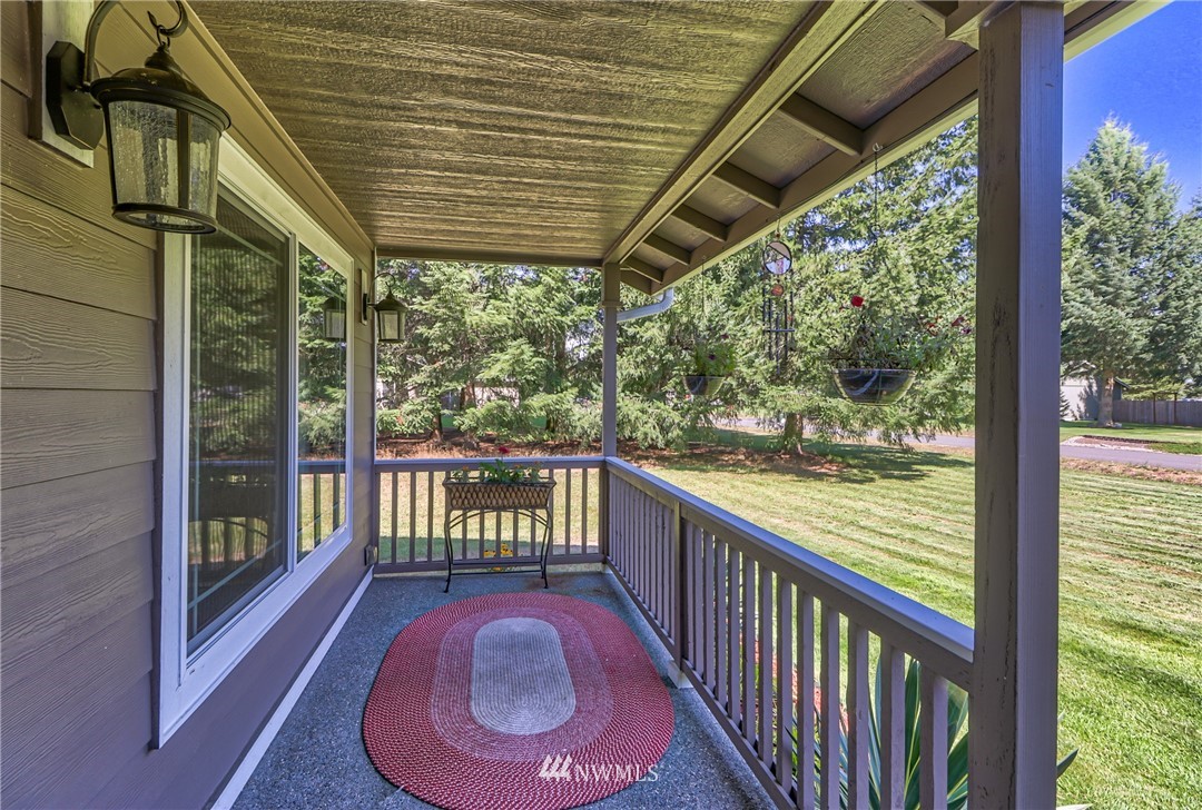 18047 Prairie Pointe Lane Southwest Rochester, WA 98579 - Photo 4 of 25 a view of balcony with wooden floor