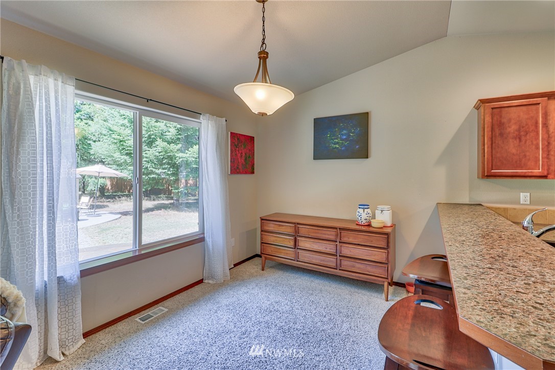 18047 Prairie Pointe Lane Southwest Rochester, WA 98579 - Photo 10 of 25 a room with furniture and window