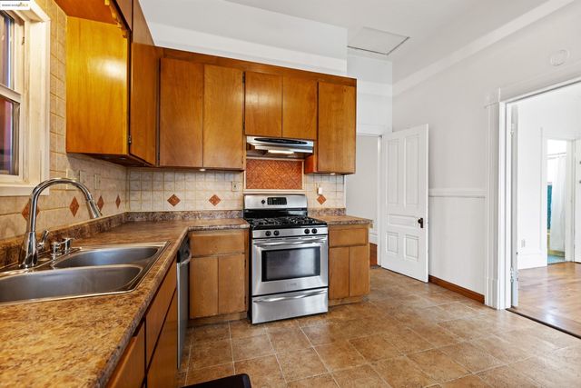 a bathroom with a sink and a window