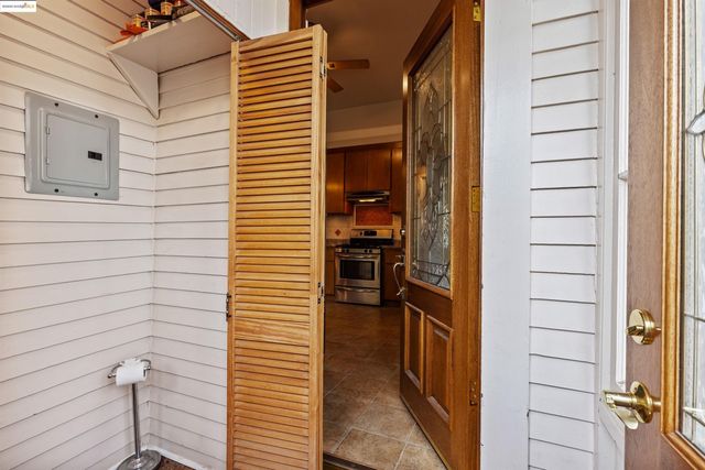 a view of a hallway with paintings on the walls