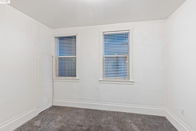 a bathroom with a sink a toilet and a shower